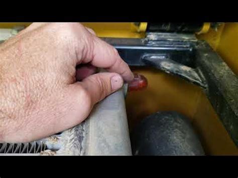 caterpillar skid steer coolant drain|john deere caterpillar coolguard review.